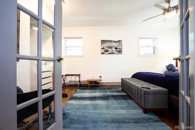 4312 Xavier St, Denver, CO 80212 - living area featuring wood finished floors, ceiling fan, and baseboards