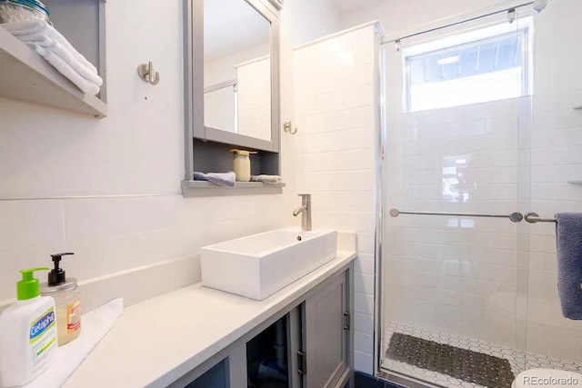4312 Xavier St, Denver, CO 80212 - full bathroom featuring a shower stall and vanity