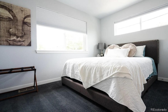 4312 Xavier St, Denver, CO 80212 - bedroom featuring dark carpet and baseboards