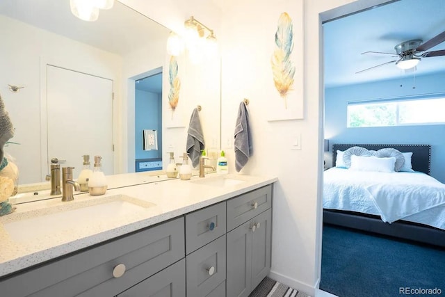 4312 Xavier St, Denver, CO 80212 - ensuite bathroom featuring double vanity and ceiling fan