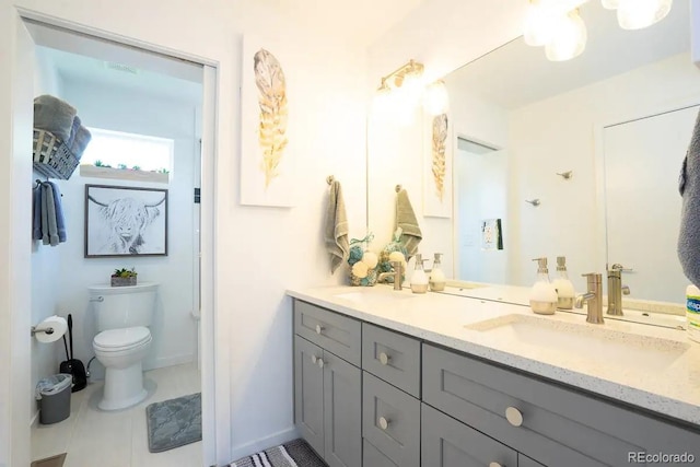 4312 Xavier St, Denver, CO 80212 - full bathroom with double vanity, baseboards, toilet, and tile patterned floors
