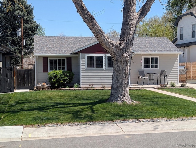 view of front of property featuring roof with shingles