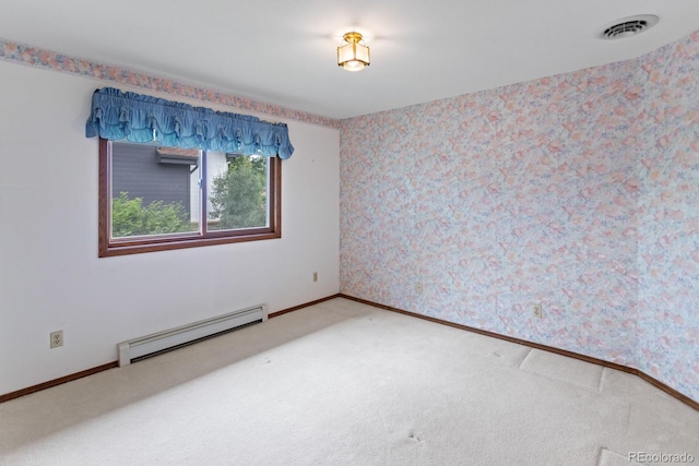 11686 W 74th Way, Arvada, CO 80005 - carpeted empty room featuring baseboard heating and wallpapered walls