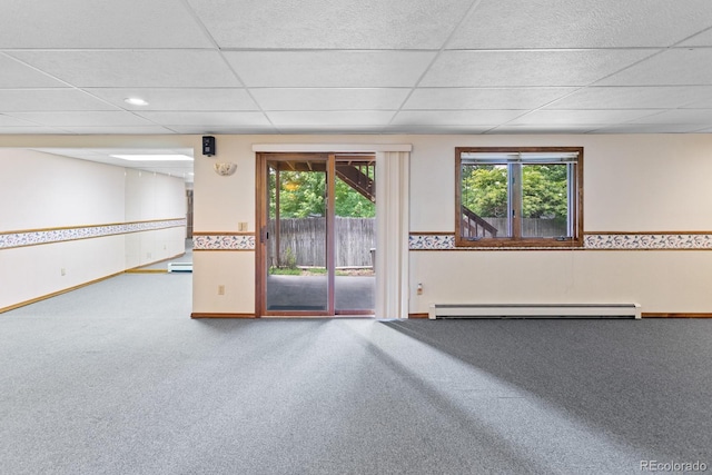 11686 W 74th Way, Arvada, CO 80005 - spare room with a baseboard radiator, carpet flooring, a paneled ceiling, and baseboard heating