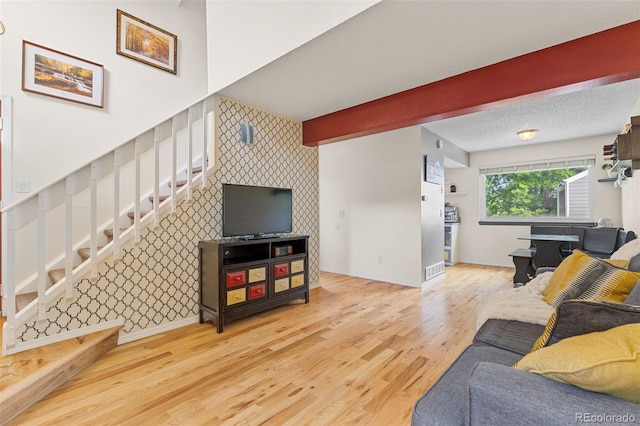 6545 W 84th Way Unit 132, Arvada, CO 80003 - living area with wood finished floors, stairway, and baseboards