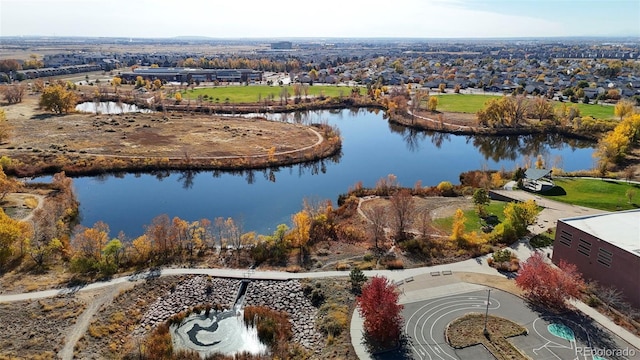 drone / aerial view with a water view