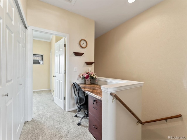 home office with baseboards and carpet