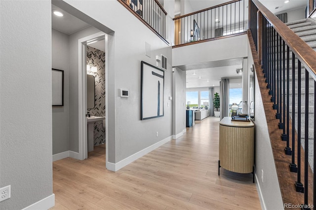 foyer entrance featuring light hardwood / wood-style flooring