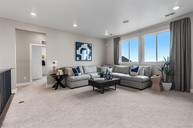 living room featuring light colored carpet