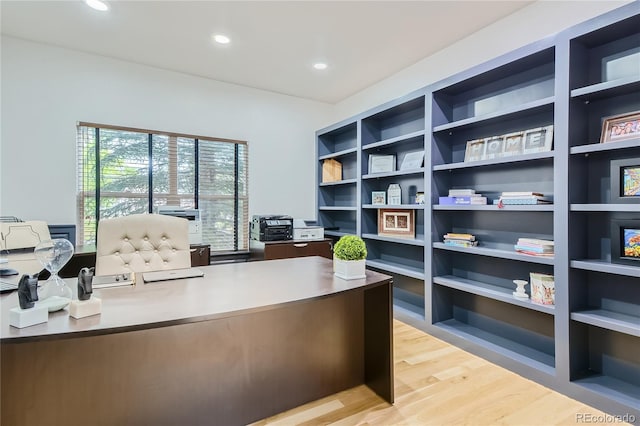 office space with recessed lighting and light wood finished floors