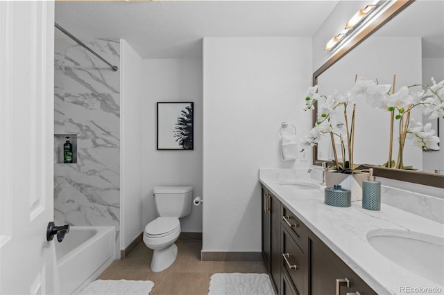 full bathroom with vanity, toilet, and tiled shower / bath combo