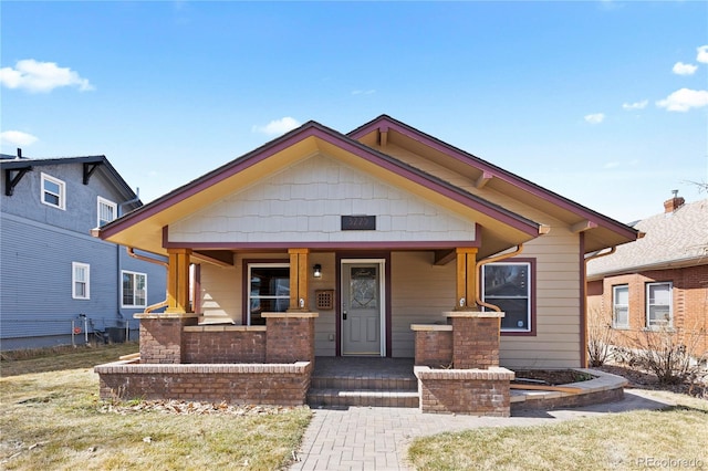 bungalow featuring covered porch