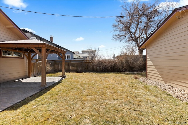 view of yard with a gazebo, a patio area, and fence