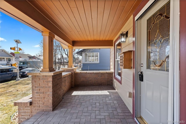 view of patio featuring a porch