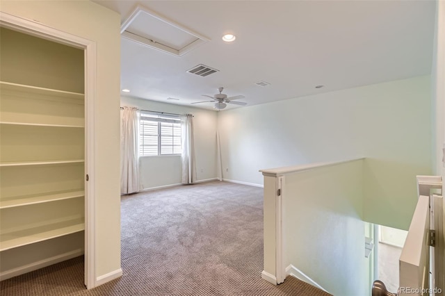 5495 Espana Ct, Denver, CO 80249 - carpeted spare room featuring attic access, recessed lighting, and a ceiling fan