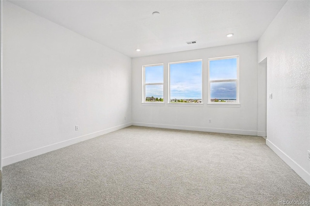 9382 Quaker St, Arvada, CO 80007 - empty room featuring light carpet, baseboards, and recessed lighting