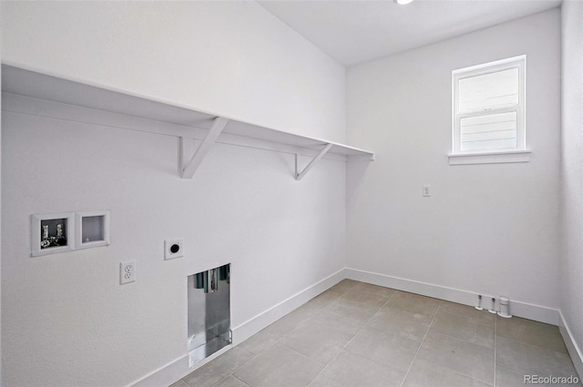 9382 Quaker St, Arvada, CO 80007 - washroom with baseboards, washer hookup, electric dryer hookup, and light tile patterned floors