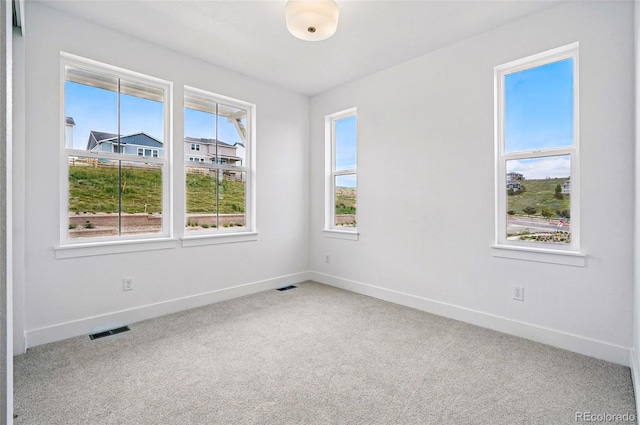 9382 Quaker St, Arvada, CO 80007 - spare room featuring baseboards and carpet