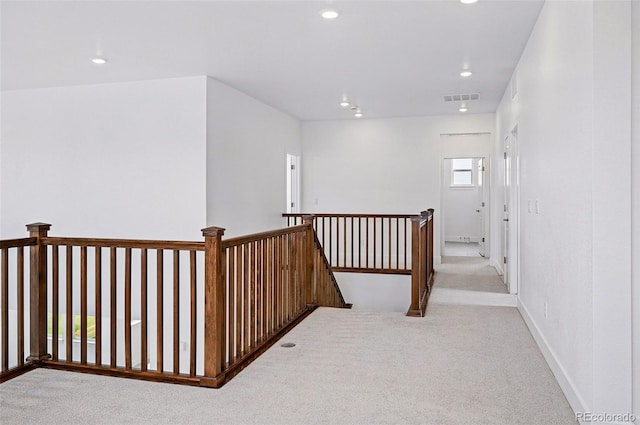 9382 Quaker St, Arvada, CO 80007 - corridor with carpet flooring, an upstairs landing, recessed lighting, and baseboards