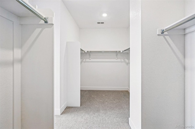 9382 Quaker St, Arvada, CO 80007 - spacious closet featuring carpet flooring