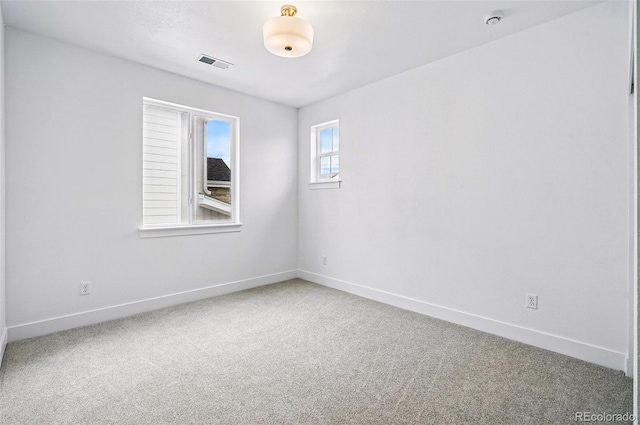 9382 Quaker St, Arvada, CO 80007 - carpeted spare room with baseboards and a smoke detector
