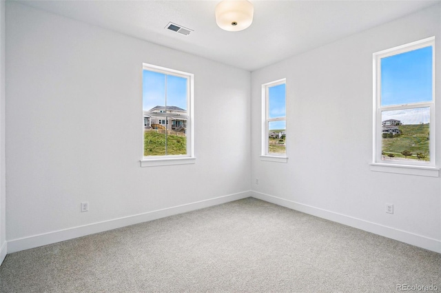 9382 Quaker St, Arvada, CO 80007 - carpeted spare room with plenty of natural light and baseboards