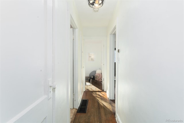 hall featuring dark hardwood / wood-style floors