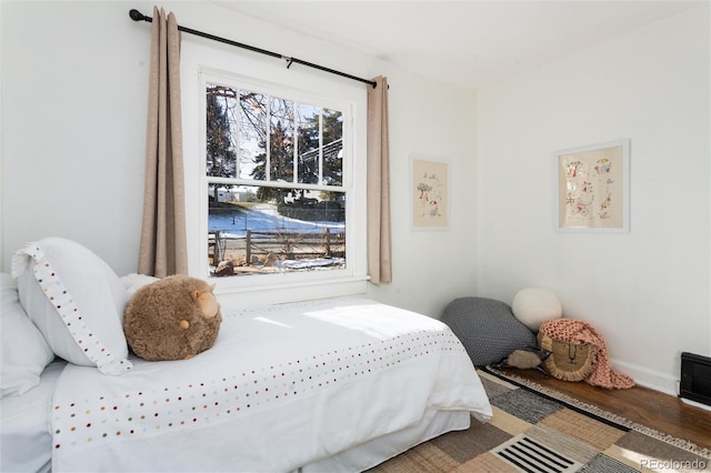 bedroom featuring hardwood / wood-style floors