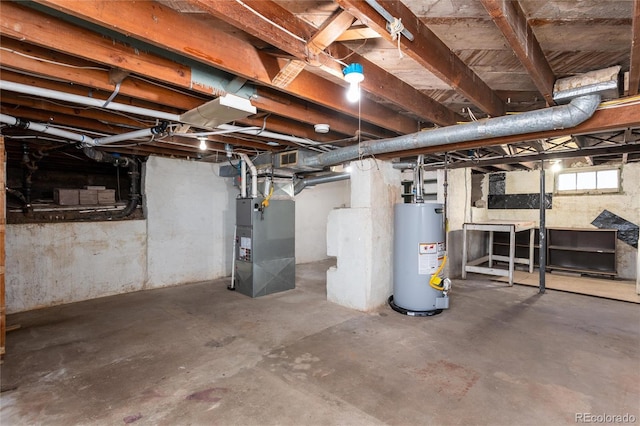 basement with heating unit and water heater