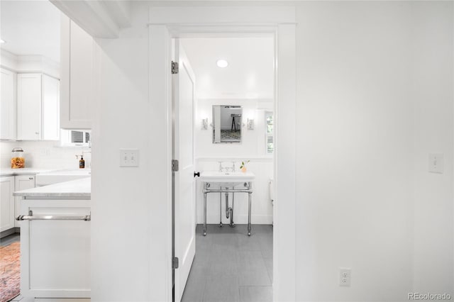 4363 N Raleigh St, Denver, CO 80212 - corridor featuring a sink and recessed lighting