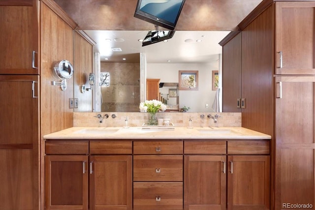 bathroom with vanity and backsplash