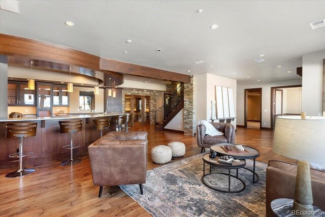 10370 Grande Vista Ct, Lone Tree, CO 80124 - living area featuring light wood-type flooring, stairway, and recessed lighting
