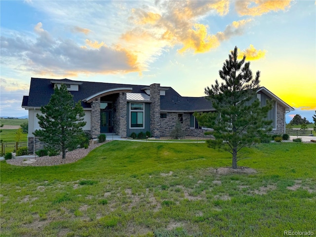 3125 Red Kit Rd, Franktown, CO 80116 - view of front of property with stone siding and a lawn