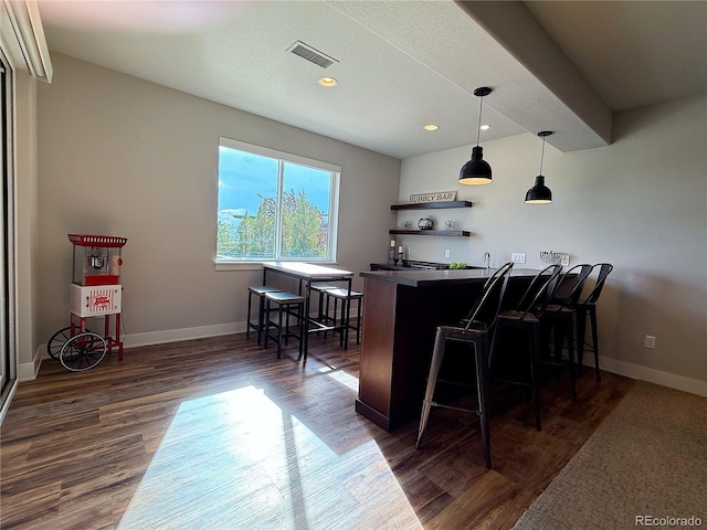 3125 Red Kit Rd, Franktown, CO 80116 - indoor wet bar featuring dark wood-style floors, recessed lighting, and pendant lighting