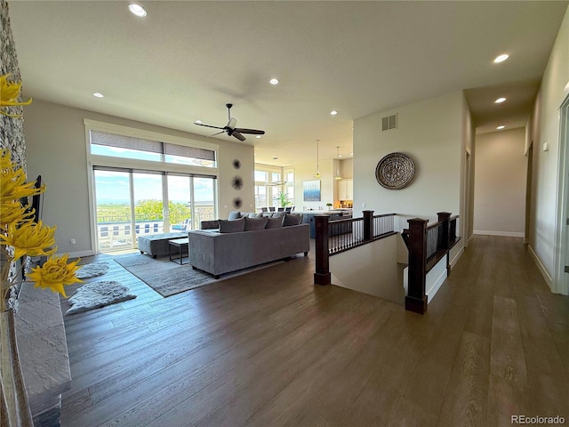 3125 Red Kit Rd, Franktown, CO 80116 - living area featuring dark wood-style floors, recessed lighting, and a ceiling fan