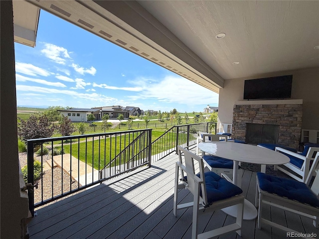 3125 Red Kit Rd, Franktown, CO 80116 - deck featuring outdoor dining area and a yard