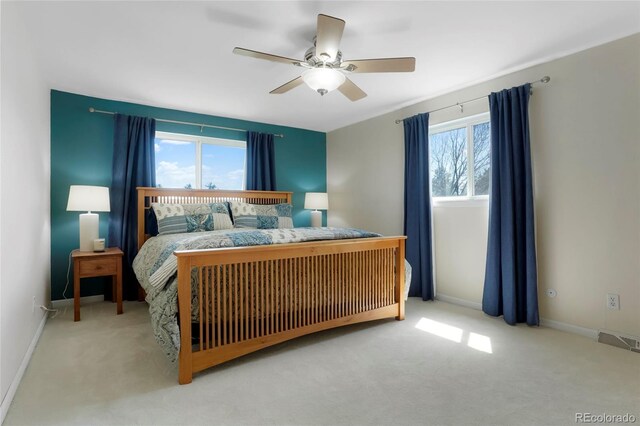 978 Mercury Cir, Lone Tree, CO 80124 - carpeted bedroom with baseboards and ceiling fan