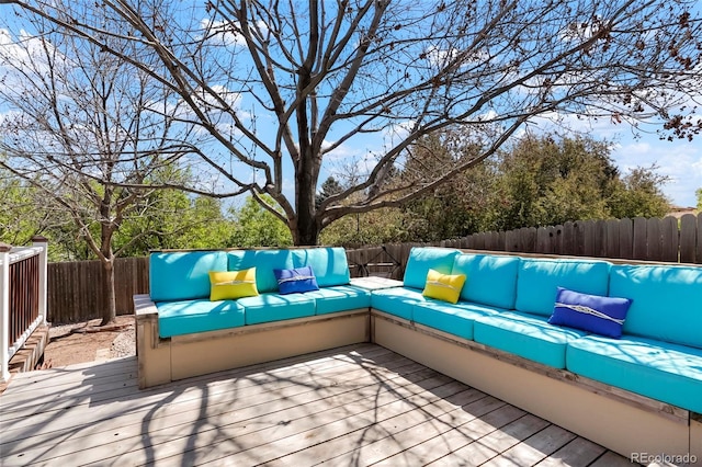 978 Mercury Cir, Lone Tree, CO 80124 - wooden terrace featuring an outdoor living space and a fenced backyard