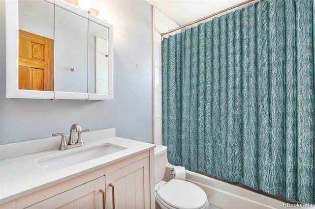 full bathroom with toilet, shower / tub combo, and vanity