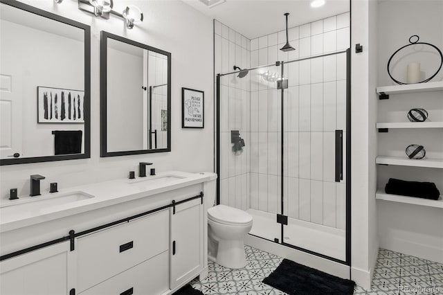 1881 Blossom Grove Dr, Windsor, CO 80550 - bathroom with a shower stall, toilet, and double vanity