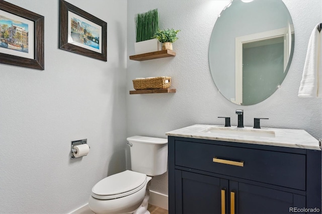 10029 Winterthur Ct, Highlands Ranch, CO 80129 - bathroom featuring vanity, toilet, and baseboards