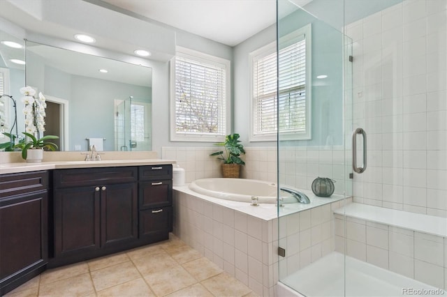 10029 Winterthur Ct, Highlands Ranch, CO 80129 - full bath featuring a stall shower, recessed lighting, tile patterned flooring, a garden tub, and vanity