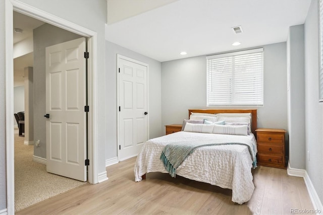 10029 Winterthur Ct, Highlands Ranch, CO 80129 - bedroom with light wood-style floors, visible vents, baseboards, and recessed lighting