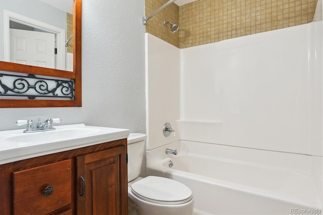 10029 Winterthur Ct, Highlands Ranch, CO 80129 - full bathroom with vanity, toilet, a textured wall, and bathing tub / shower combination