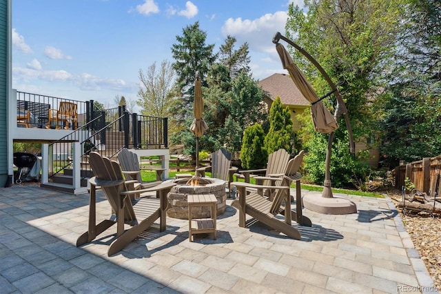 10029 Winterthur Ct, Highlands Ranch, CO 80129 - view of patio featuring an outdoor fire pit, stairway, and area for grilling