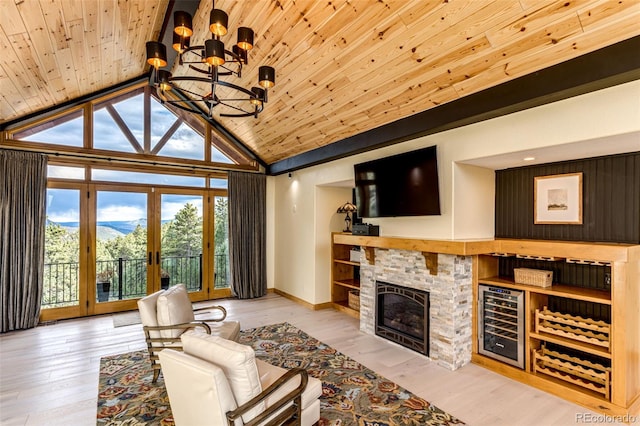 14564 Reserve Rd, Pine, CO 80470 - living room with a chandelier, wooden ceiling, beverage cooler, vaulted ceiling, and wood finished floors