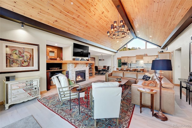 14564 Reserve Rd, Pine, CO 80470 - living area with a chandelier, a fireplace, wood ceiling with exposed beams, high vaulted ceiling, and recessed lighting