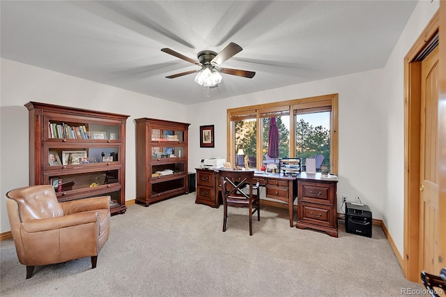 14564 Reserve Rd, Pine, CO 80470 - office with light colored carpet, ceiling fan, and baseboards