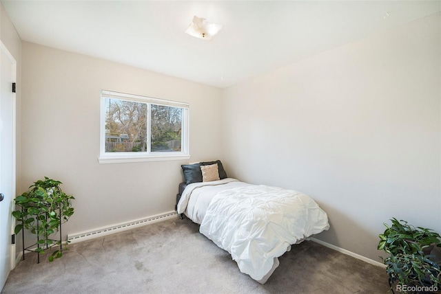 carpeted bedroom with baseboards and baseboard heating