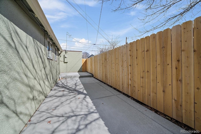exterior space featuring fence and a patio area